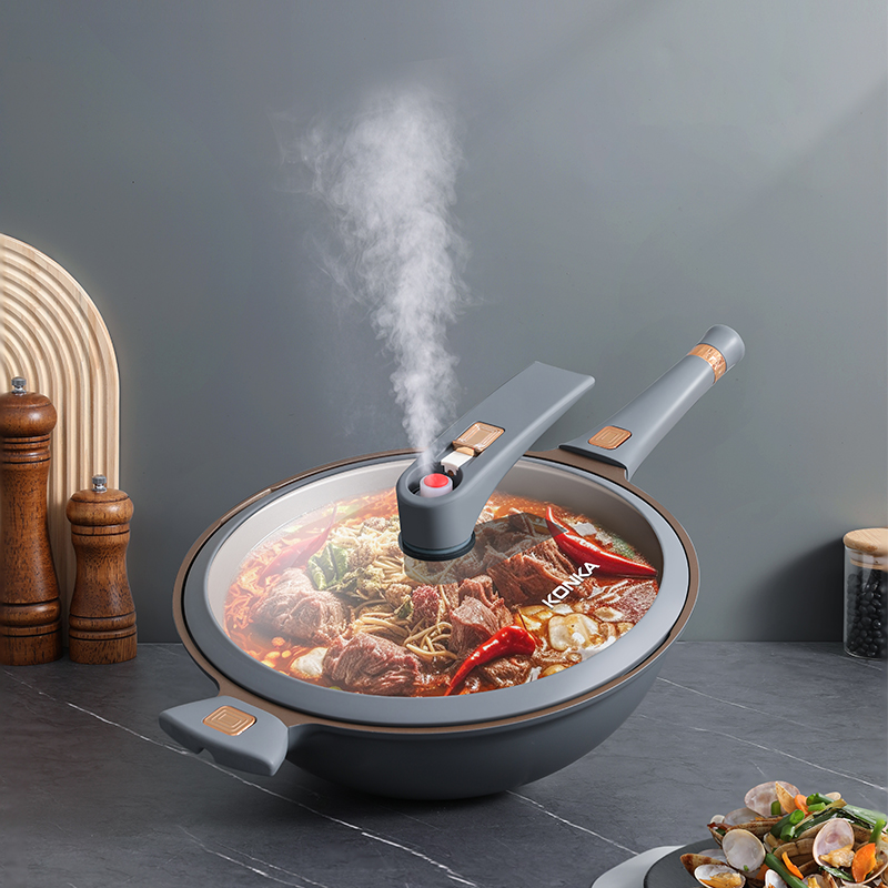 康佳 KCG-3210  锅身直径：32cm 黑灰色
材质：铝压铸 康佳钛合金微压炒锅 KCG-3210 32cm 黑灰色  （单位：台） 康佳钛合金微压炒锅 KCG-3210 32cm 黑灰色